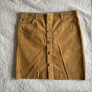 Tommy Hilfiger skirt. button down the front. like new